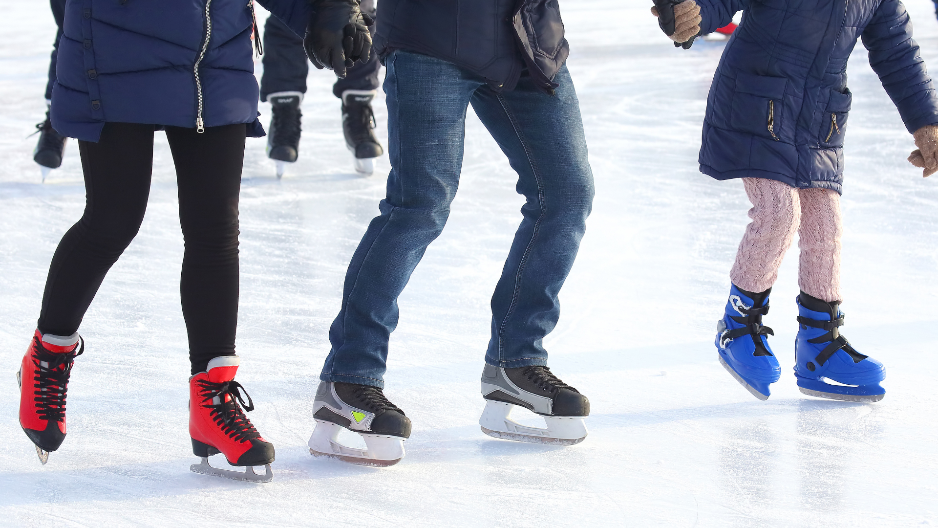 Family ice skating near cardiff